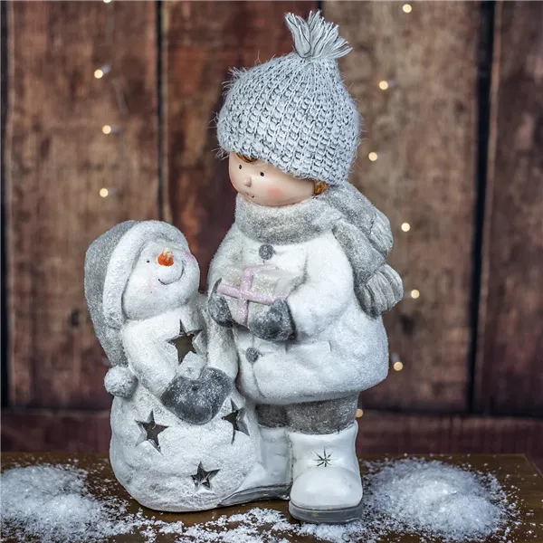 Child with snowman X2636
