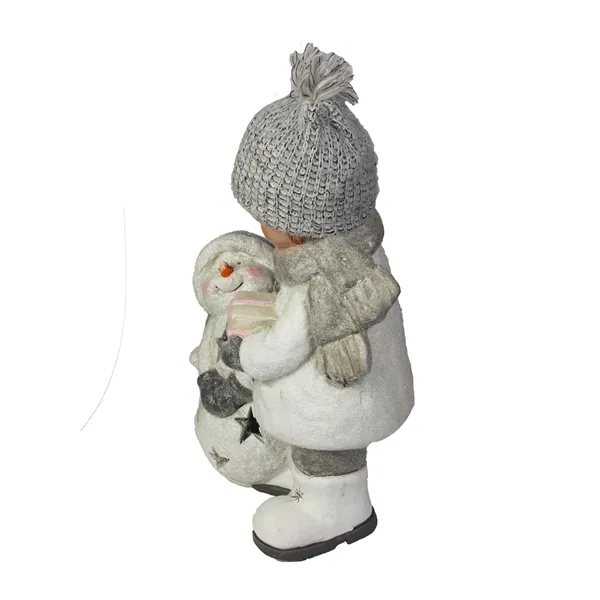 Child with snowman X2636